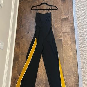 Black Jumpsuit with Yellow Stripes on the side